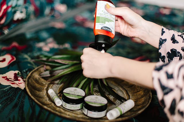 person%20putting%20CBD%20creme%20on